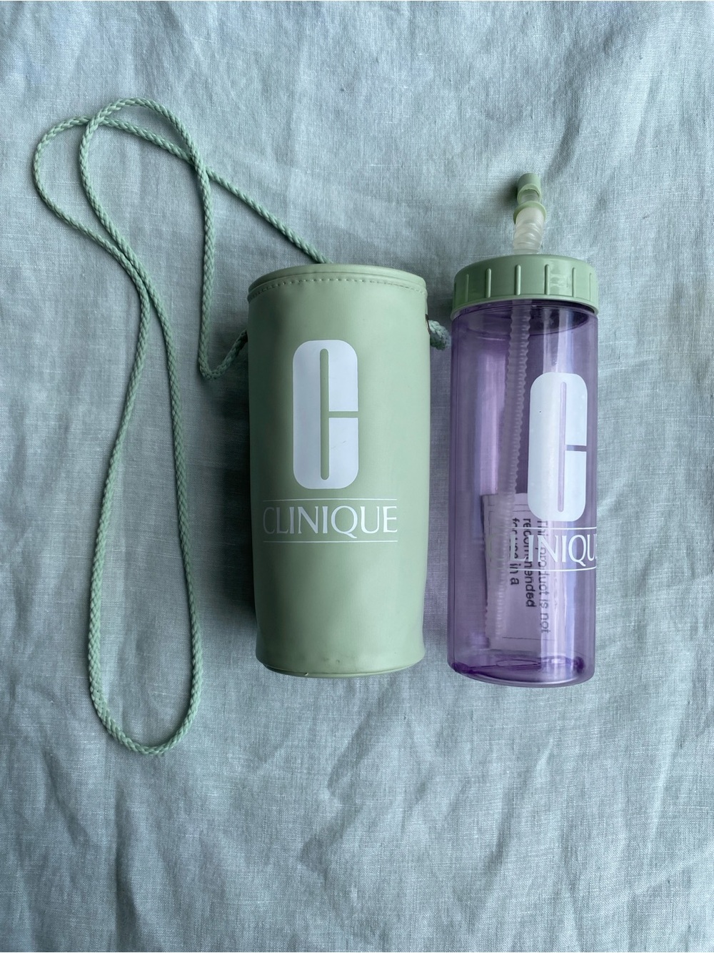 RARE NWOT Clinique water bottle and carry bag case holder